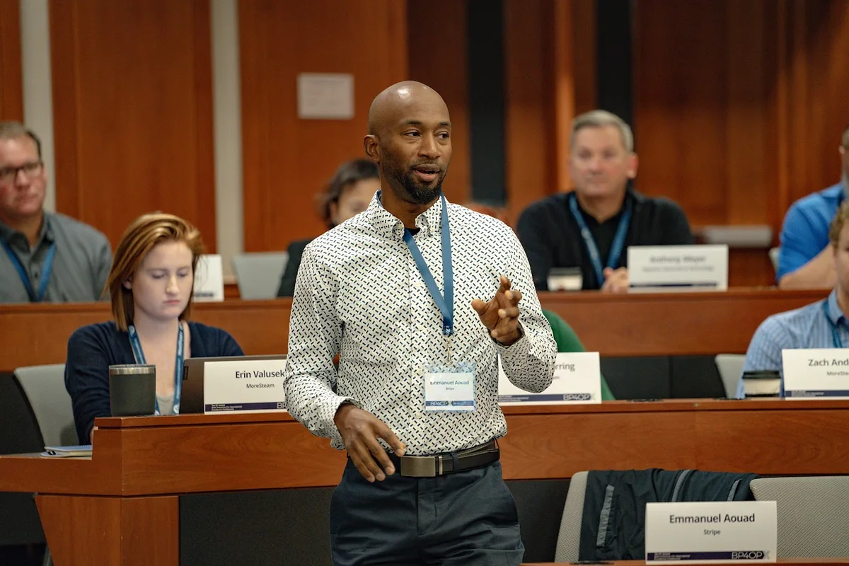 Emmanuel Aouad speaking during a panel session.